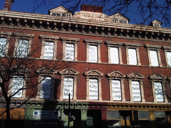 Message in the windows of Treble Hall