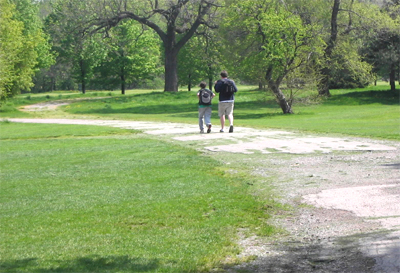 Local residents enjoying a stroll, or dangerous vandals casing their escape route? (Photo Credit: Ted Mitchell)