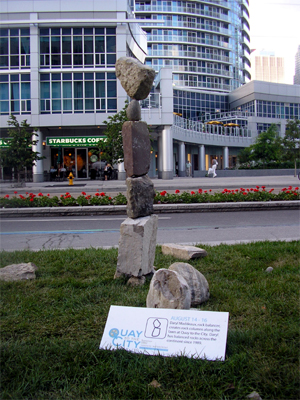 Rock Balancer Daryl Maddeaux does his thing. Careful, now; nobody sneeze...