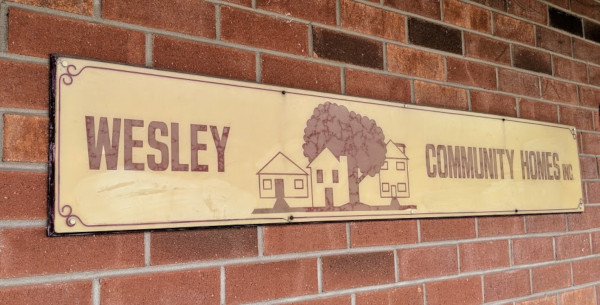 Wesley Community Homes Inc. sign