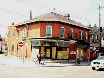 Joe Stanicak, owner of the West Town, has bought the two adjacent properties and wants to make the open space beside the corner building into the patio of a dessert bistro