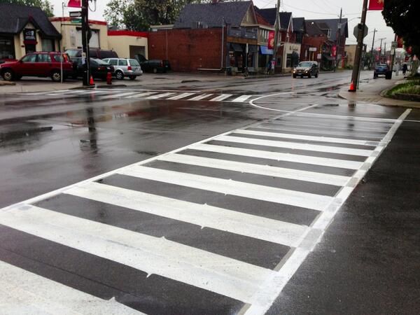 Crosswalk hatches and painted bumpouts at Locke and Herkimer